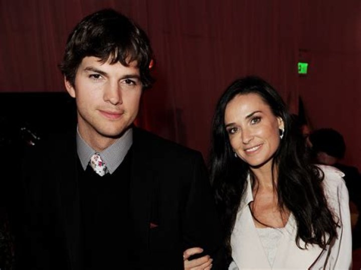 Demi Moore Showing Pics Of Former Love Ashton Kutcher