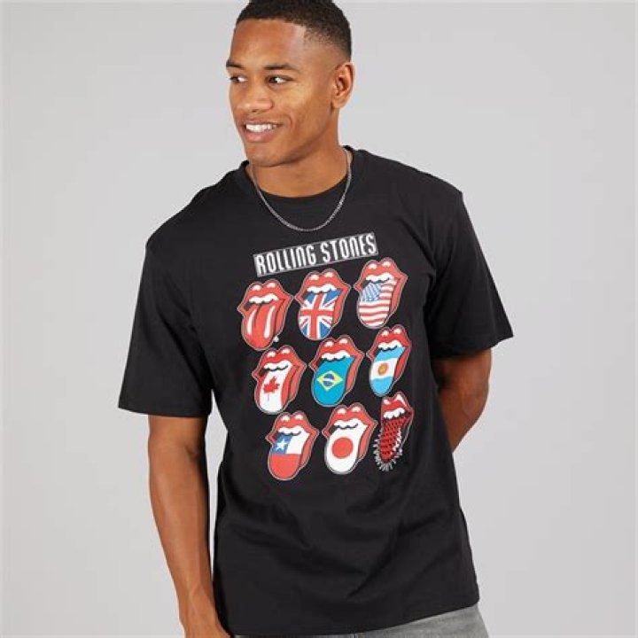 Harry Styles Looks Smashing in Fan Favorite Ripped Rolling Stones Tee
